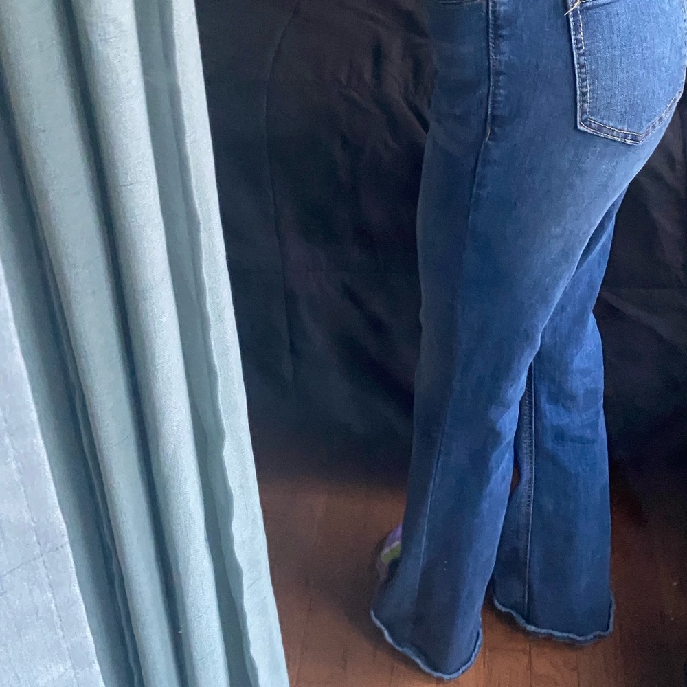 Blue high waisted flared/bootcut cut jeans